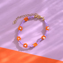 Laden Sie das Bild in den Galerie-Viewer, Perlenarmband Blumen lila/orange