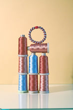 Laden Sie das Bild in den Galerie-Viewer, Haargummi Rosewood seablue glitter